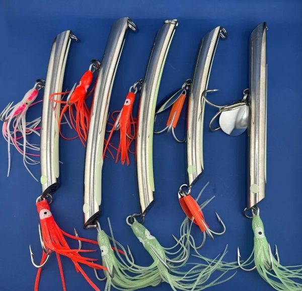 Pilkers weight 400-450 gr, Vertical jigging in the cold northern seas. Handmade. Polished stainless steel. Mustad 8/0 triple hook. Attractive elements-light-accumulating stickers, octopus, chrome-plated petal randomly